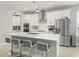 Modern kitchen with stainless steel appliances and a large kitchen island at 3840 Se 6Th Ave, Ocala, FL 34480