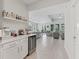Open-concept living space with a bar area, perfect for entertaining guests at 3840 Se 6Th Ave, Ocala, FL 34480