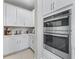 A well-appointed kitchen is equipped with double ovens and ample counter space at 3840 Se 6Th Ave, Ocala, FL 34480