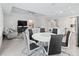 View of the living and dining area featuring ample natural light and an open floor plan at 3840 Se 6Th Ave, Ocala, FL 34480
