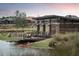 Community deck with seating near water and kayak at 4050 Nw 48Th Terrace Rd, Ocala, FL 34482