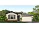 Beautiful single-story home with stone accents, a two-car garage, and well-maintained landscaping at 4050 Nw 48Th Terrace Rd, Ocala, FL 34482