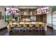 Clubhouse kitchen featuring a large island with seating and modern appliances at 4050 Nw 48Th Terrace Rd, Ocala, FL 34482