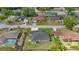 One-story home with manicured backyard lawn and a long driveway in a serene residential neighborhood at 5144 Ne 9Th St, Ocala, FL 34470