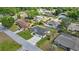 Beautiful one-story home with a green lawn, long driveway, and fenced backyard in a residential neighborhood at 5144 Ne 9Th St, Ocala, FL 34470