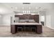 Modern kitchen with a large island, stainless steel appliances, and ample counter space at 5144 Ne 9Th St, Ocala, FL 34470
