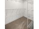 Walk-in closet featuring neutral carpet and white wire shelving at 5144 Ne 9Th St, Ocala, FL 34470