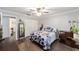 Spacious bedroom with vinyl flooring, natural light, and closet at 5720 Se 22Nd Pl, Ocala, FL 34480