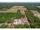The neighborhood, captured from above, displays a community integrated within a lush, green environment at 6840 Sw 198Th Ave, Dunnellon, FL 34431