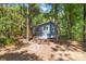Quaint, one-story home nestled amongst the trees with a charming, covered front porch at 6840 Sw 198Th Ave, Dunnellon, FL 34431