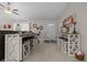 Open-concept area with adjacent entry door and stylish bar stool seating and decorative furnishings at 7886 Sw 103Rd Loop, Ocala, FL 34476