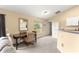 Dining space featuring a table set with four chairs next to the kitchen at 8 Hemlock Radl, Ocala, FL 34472