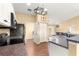 A well lit kitchen with stainless steel appliances and an opening to the living room at 8 Hemlock Radl, Ocala, FL 34472