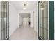 Inviting entryway featuring stylish tile flooring and a view of the open-concept living space at 8497 Sw 99Th Cir, Ocala, FL 34481