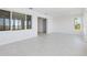 Bright living room with windows and tile floors provides an open airy feeling at 8497 Sw 99Th Cir, Ocala, FL 34481