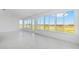 Bright sunroom with tile floors and walls of windows providing lots of natural light at 8497 Sw 99Th Cir, Ocala, FL 34481