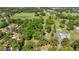 Lush, wooded acreage as seen from above, nestled among the green pastures and natural beauty of the countryside at 8630 Sw 20Th Ct, Ocala, FL 34476