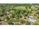 Expansive rural property from above, dotted with mature trees and neighboring homes in a peaceful setting at 8630 Sw 20Th Ct, Ocala, FL 34476