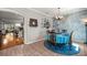 Elegant dining room with stylish decor and a view into the living spaces at 8630 Sw 20Th Ct, Ocala, FL 34476