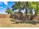 Backyard view displays a treehouse fort with ladder and slide, perfect for play at 8630 Sw 20Th Ct, Ocala, FL 34476