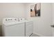 Functional laundry room featuring a modern washer and dryer at 8632 Sw 44Th Ter, Ocala, FL 34476