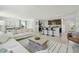 Open-concept living space with seamless flow between the living, dining, and kitchen areas at 8632 Sw 44Th Ter, Ocala, FL 34476