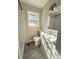 Stylish bathroom features updated tiling, a vanity, and a tiled shower at 910 Ne 11Th Ave, Ocala, FL 34470