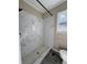 Modern bathroom features a beautiful marble-tiled shower and updated fixtures at 910 Ne 11Th Ave, Ocala, FL 34470