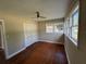 Bright bedroom with beautiful hardwood flooring and natural light at 910 Ne 11Th Ave, Ocala, FL 34470