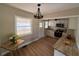Updated kitchen featuring butcher block counters, stainless steel appliances, and a dining area at 910 Ne 11Th Ave, Ocala, FL 34470