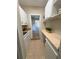 Well-organized pantry features ample cabinet and counter space at 910 Ne 11Th Ave, Ocala, FL 34470