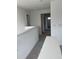 Upstairs hallway featuring neutral walls and carpet leading to the bedrooms at 9326 Sw 57Th Ter, Ocala, FL 34476