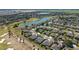 Breathtaking aerial view of a community with pond views and proximity to the golf course at 9443 Sw 71St Loop, Ocala, FL 34481