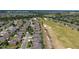 Community aerial with golf course, ponds, and beautifully landscaped homes in a well-planned neighborhood at 9443 Sw 71St Loop, Ocala, FL 34481