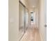 Hallway with closet doors and neutral carpet at 9443 Sw 71St Loop, Ocala, FL 34481