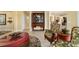 Elegant living space boasting tile floors, stylish furniture, and an open design, ideal for modern living and entertaining at 9443 Sw 71St Loop, Ocala, FL 34481