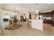 Open concept kitchen, dining, and living space with tropical decor, perfect for entertaining and Gathering time at 9443 Sw 71St Loop, Ocala, FL 34481