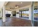 Spacious screened patio with multiple ceiling fans and golf course views, great for entertaining at 9443 Sw 71St Loop, Ocala, FL 34481