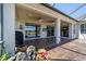 Open screened patio featuring ceiling fans, a built-in grill, and golf course views at 9443 Sw 71St Loop, Ocala, FL 34481