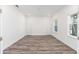Bonus room has wood-look floors, natural light, and two closets at 9973 Sw 107Th Ter, Ocala, FL 34481