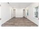 Bonus room has wood-look floors, natural light, and two walk-in closets at 9973 Sw 107Th Ter, Ocala, FL 34481
