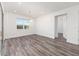 Dining room filled with natural light, light fixture, and wood-look flooring at 9973 Sw 107Th Ter, Ocala, FL 34481