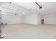Bright garage features ample space and functionality, offering room for vehicles and storage at 9973 Sw 107Th Ter, Ocala, FL 34481