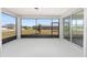 Enclosed lanai with great neighborhood views, and large windows, ideal for relaxation and enjoying the outdoors at 9973 Sw 107Th Ter, Ocala, FL 34481