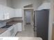 Functional kitchen with white cabinets and appliances at 11653 Sw 72Nd Cir, Ocala, FL 34476