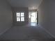 Inviting living room with plush carpet and natural light at 11653 Sw 72Nd Cir, Ocala, FL 34476
