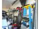 Organized garage interior with tools, equipment, and storage solutions for efficient space utilization at 12002 Sw 137Th Loop, Dunnellon, FL 34432