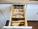 Organized kitchen drawer with custom dividers for cutlery, knives, and utensils at 12002 Sw 137Th Loop, Dunnellon, FL 34432
