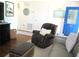 Relaxing living room featuring comfortable seating, and a colorful entrance door at 12002 Sw 137Th Loop, Dunnellon, FL 34432