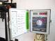 Rain Bird sprinkler control panel with detailed programming instructions for optimizing lawn irrigation at 12002 Sw 137Th Loop, Dunnellon, FL 34432